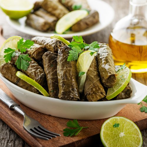 dolma,,stuffed,grape,leaves,with,rice,and,meat,on,wooden